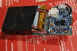 CareTether V1 with a taped battery and development-board electronics.